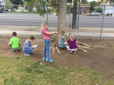 Kids outside learning on becoming an author