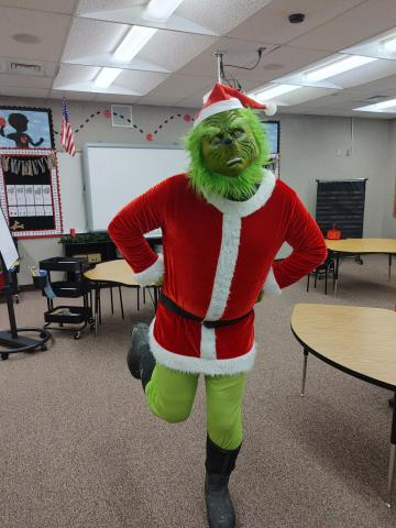 Mr. Grinch came and visited 2nd Grade. 