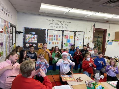 5th graders performing actions to Twas the night before Christmas