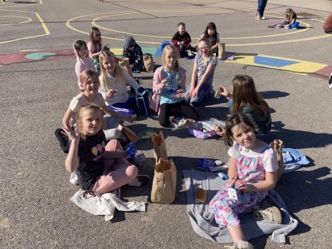 2nd Graders outside eating lunch