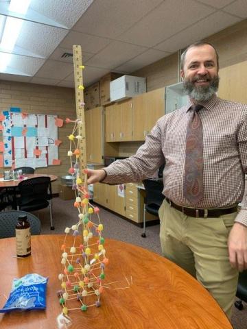 Mr. Kern measuring his gumdrop tower