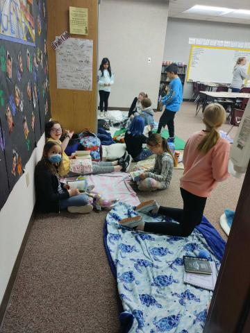 Mrs. Webb's class reading with friends