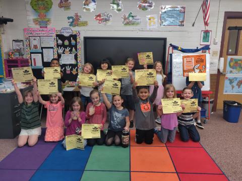 Mrs. Hunt's class with their reading challenge calenders!