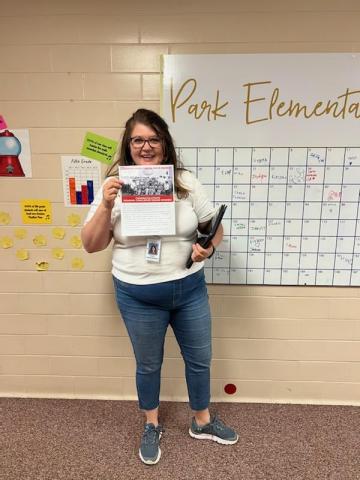 Mrs. McEntire with her rodeo tickets!