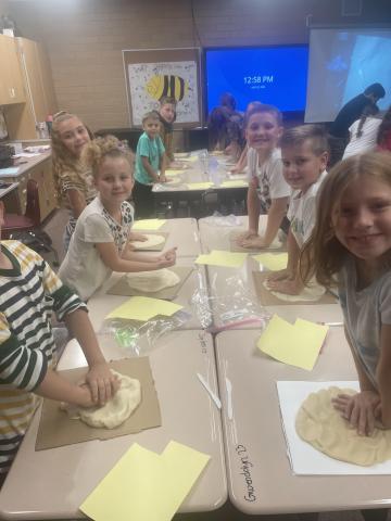 4th graders forming their Utah landforms