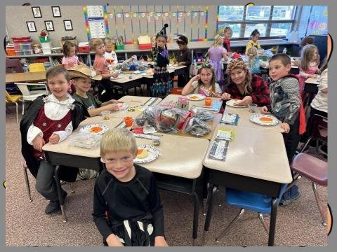 1st graders showing off their cookies