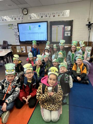 Class photo with their St. Patrick's day treats