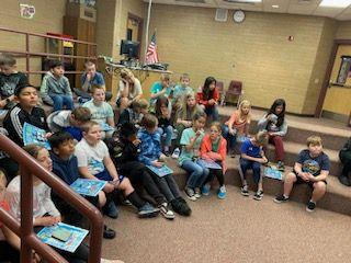4th graders listening to the presentation