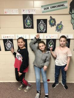 5th graders showing off their zombie art.