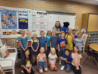 Ms. Davenport and her class with Parker