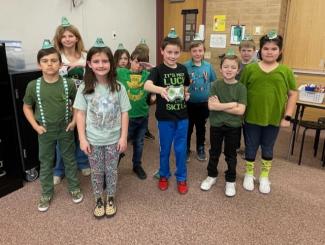3rd graders and their leprechaun hats