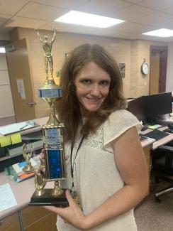 Ms. Webster with her trophy